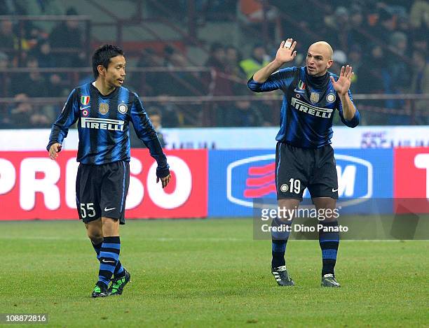 Yuto Nagatomo of Inter Milan speaks with Esteban Cambiasso during the Serie A match between F C Internazionale Milano and AS Roma at Stadio Giuseppe...