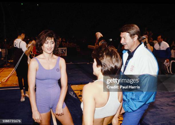 Nadia Comaneci an Olympic athlete talks to her coach from 6 years old Béla Károlyi January 1, 1991in Santa Monica, Los Angeles, California