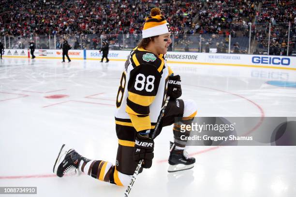 David Pastrnak of the Boston Bruins warms up before the 2019 Bridgestone NHL Winter Classic against the Chicago Blackhawks at Notre Dame Stadium on...