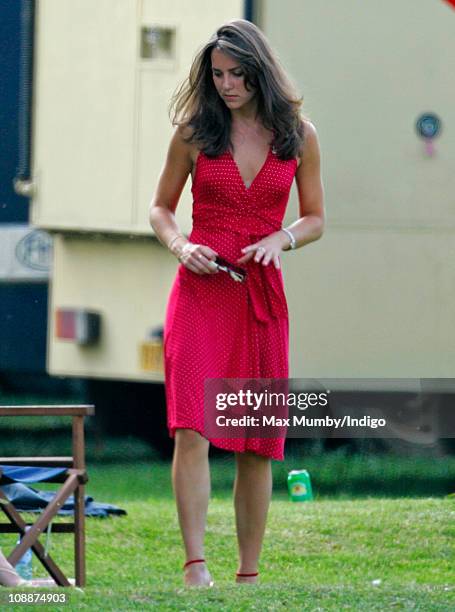 Kate Middleton watches Prince William compete in the Chakravarty Cup charity polo match at Ham Polo Club on June 17, 2006 in Richmond, England.