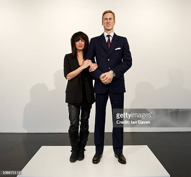 Artist Jennifer Rubell poses next to her wax model of Prince William entitled "Engagement" at the Stephen Friedman Gallery on February 7, 2011 in...