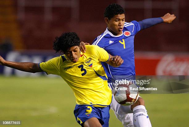 Jorge Ramos player from Colombia, fights for the ball with Jhon Narvaez , player of Ecuador, during the match between national teams of Colombia and...