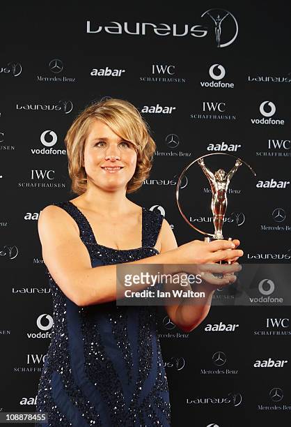 Skier and Biathlete Verena Bentele of Germany poses with her award for Laureus World Sportsperson of the Year with a Disability in the winners...