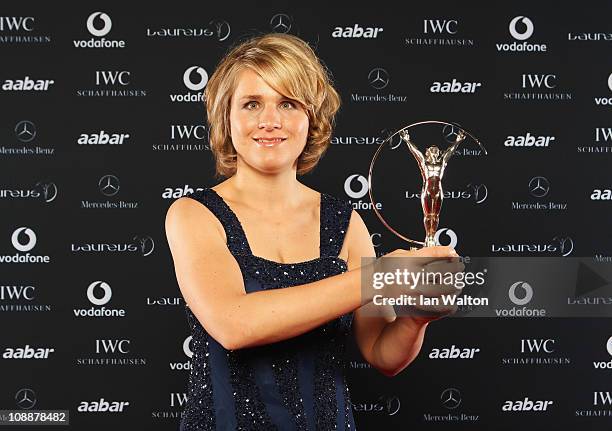 Skier and Biathlete Verena Bentele of Germany poses with her award for Laureus World Sportsperson of the Year with a Disability in the winners...