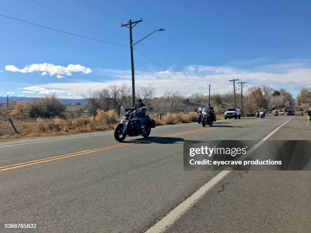 motorcycle riders on rural america roadway - motorcycle group stock pictures, royalty-free photos & images