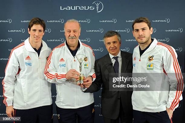 Head coach of the Spanish team Vicente del Bosque and Spanish team players Fernando Torres and Iker Casillas receive the Laureus Team award from the...