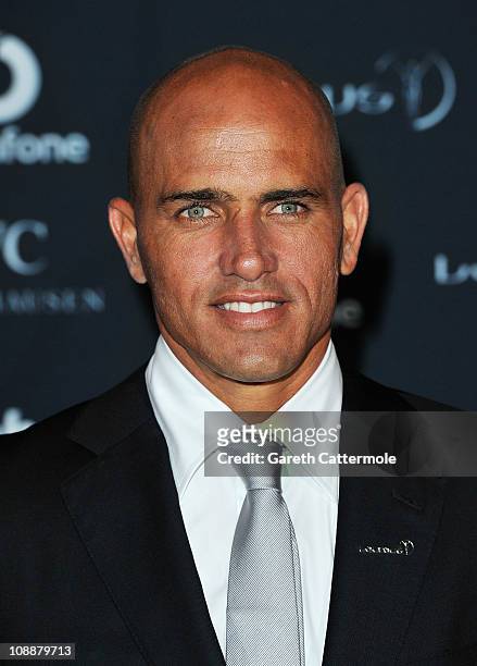 Surfer Kelly Slater of the United States poses with his award for Laureus World Action Sportsperson of the Year in the winners studio at the 2011...