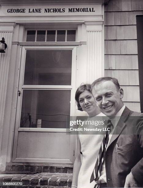 Cold Spring Harbor, N.Y.: Dr. James Watson, director of the Cold Spring Harbor Laboratory shows his wife Elizabeth Watson the facilities of the lab...