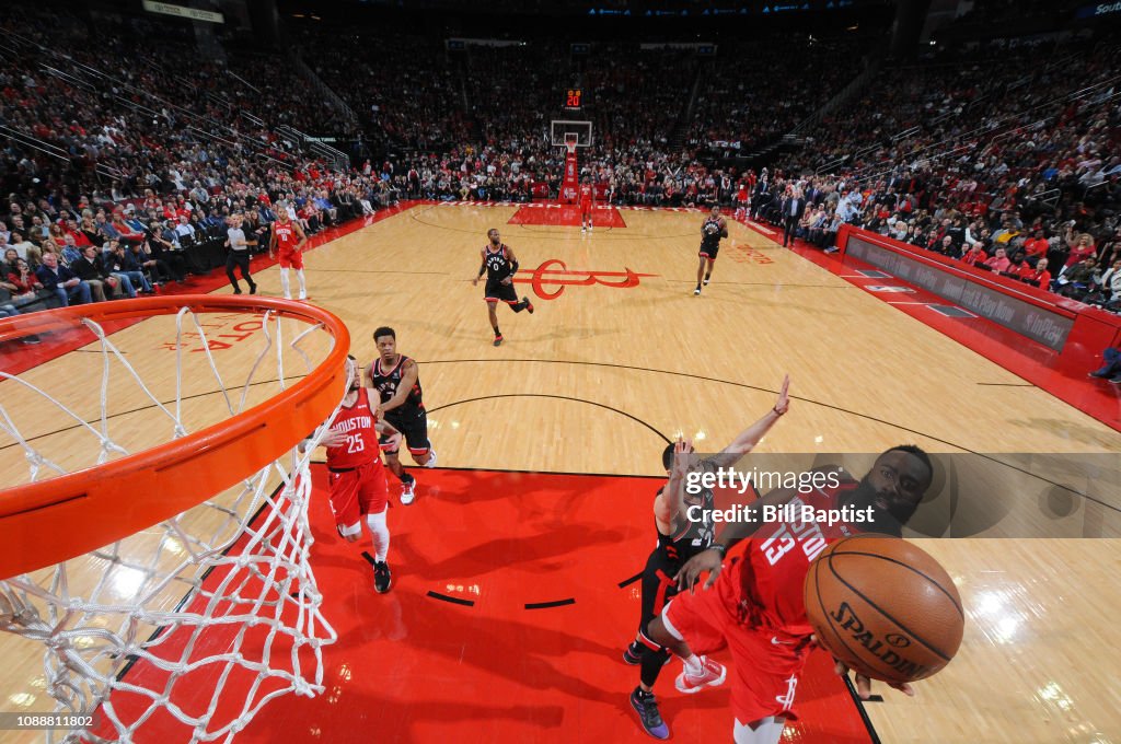 Houston Rockets Toronto Raptors James Harden of the Houston Rockets drives to the basket during the ...