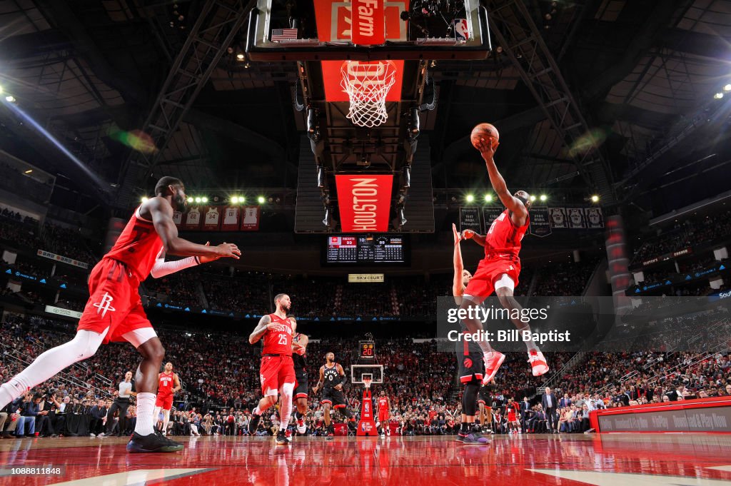 Houston Rockets Toronto Raptors James Harden of the Houston Rockets drives through the paint during ...