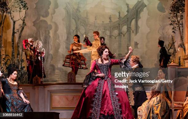 With the cast, Russian soprano Anna Netrebko performs at the final dress rehearsal prior to the premiere of the Metropolitan Opera/Sir David McVicar...