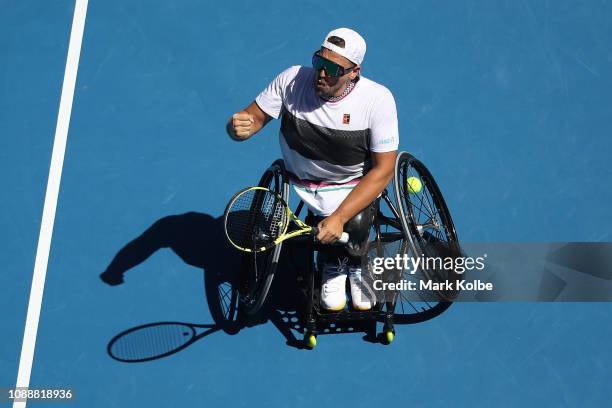 Dylan Alcott of Australia celebrates winning championship point in his Quad Wheelchair Singles Final match against David Wagner of the United States...