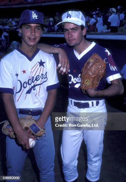 Actors Chad Lowe and Charlie Sheen attend Hollywood All-Stars Baseball Game on August 23, 1986 at Dodgers Stadium in Los Angeles, California.
