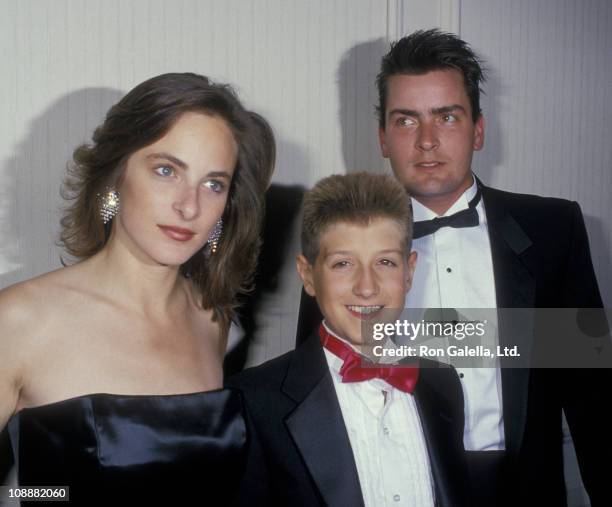 Actress Marlee Matlin, Ryan White and actor Charlie Sheen attend For Love Of Children AIDS Benefit Gala on July 8, 1988 at the Century Plaza Hotel in...