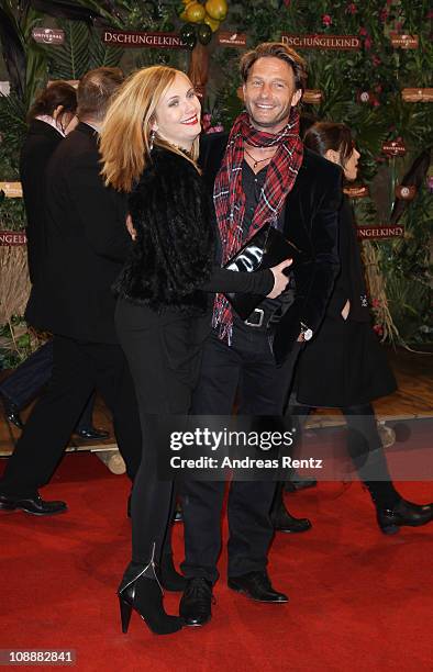 Actress Nadja Uhl and actor Thomas Kretschmann attend the 'Dschungelkind' Premiere at CineStar on February 7, 2011 in Berlin, Germany.