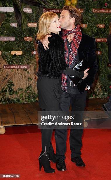 Actress Nadja Uhl and actor Thomas Kretschmann attend the 'Dschungelkind' Premiere at CineStar on February 7, 2011 in Berlin, Germany.