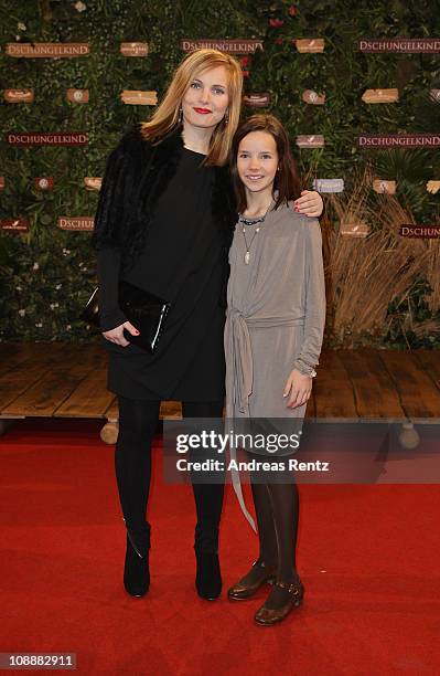 Actress Nadja Uhl and young actress Stella Kunkat attend the 'Dschungelkind' Premiere at CineStar on February 7, 2011 in Berlin, Germany.