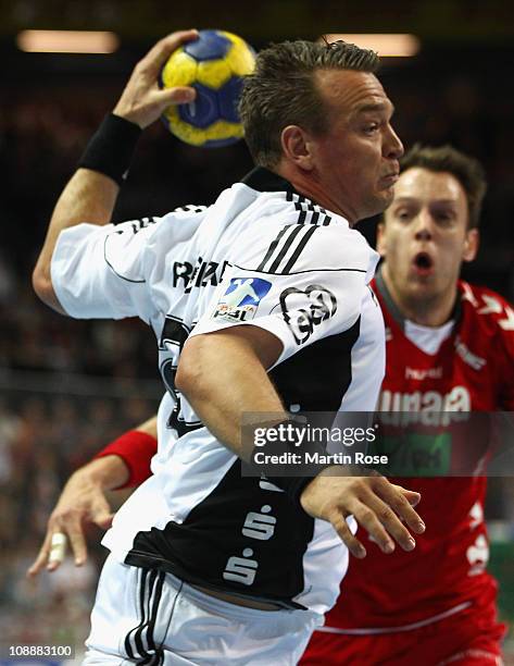 Christian Zeitz of Kiel throws at goal during the Toyota Handball Bundesliga match between THW Kiel and HSG Ahlen at the Sparkassen Arena on February...