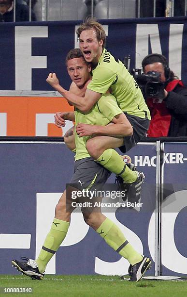 Marcel Gaus and Maximilian Beister of Fortuna Duesseldorf celebrate their first goal during the second Bundesliga match between 1860 Muenchen and...