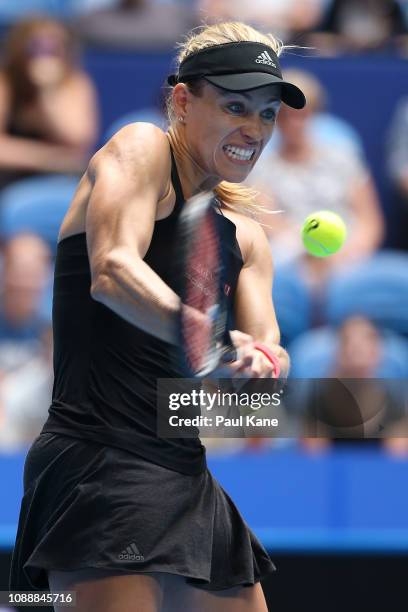 Angelique Kerber of Germany plays a backhand to Alize Cornet of France during day five of the 2019 Hopman Cup at RAC Arena on January 02, 2019 in...