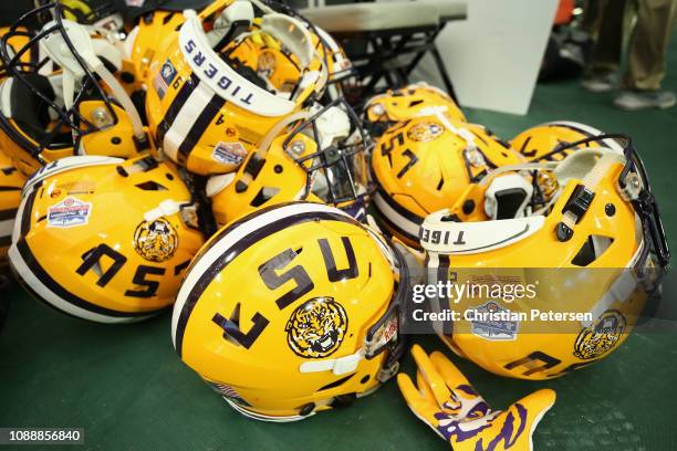 Helmets for the LSU Tigers on the field following the PlayStation Fiesta Bowl against the UCF Knights at State Farm Stadium on January 01, 2019 in...