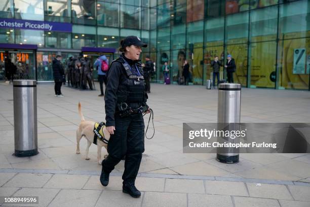 Police patrol Manchester's Piccadilly Station during heightened security after the stabbing on Monday at nearby at Victoria Station on January 02,...