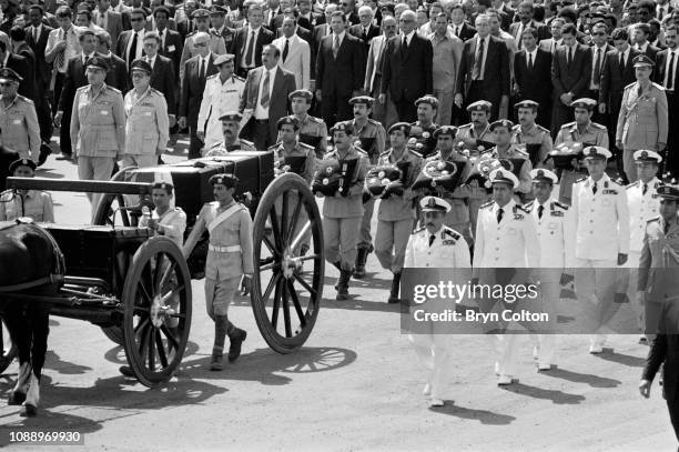 World leaders follow the flag draped coffin containing the body of assassinated Egyptian president Anwar Sadat on a horse-drawn carriage and past the...