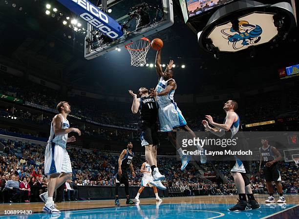 Quincy Pondexter of the New Orleans Hornets dunks against Nikola Pekovic of the Minnesota Timberwolves during the game on February 7, 2011 at the New...