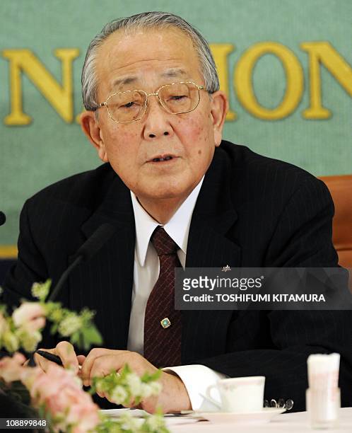 Japan Arilines CEO Kazuo Inamori answers a question during his press conference at the Japan National Press Club in Tokyo, on February 8, 2011....