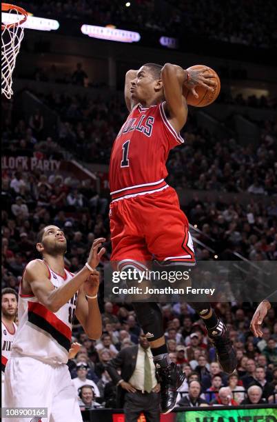 Derrick Rose of the Chicago Bulls dunks against the Portland Trail Blazerson February 7, 2011 at the Rose Garden in Portland, Oregon. NOTE TO USER:...