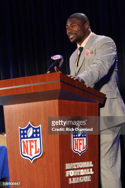 Player Ovie Mughelli of the Atlanta Falcons speaks at the Super Bowl Gospel Celebration 2011 Press Conference in the NFL Media Center on February 4,...