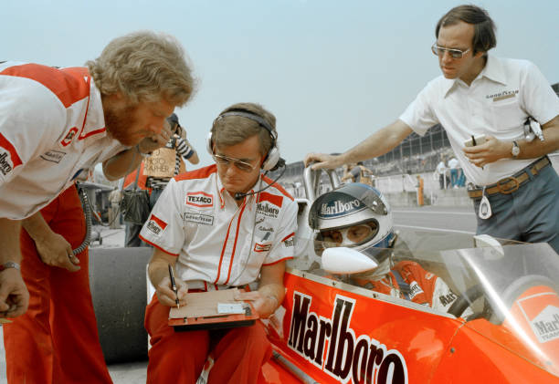 Patrick Tambay of France in the McLaren M26 talking with his engineer Alistair Caldwell during the British Grand Prix at the Brands Hatch circuit in...