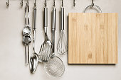Close-up of kitchen items, wall on background