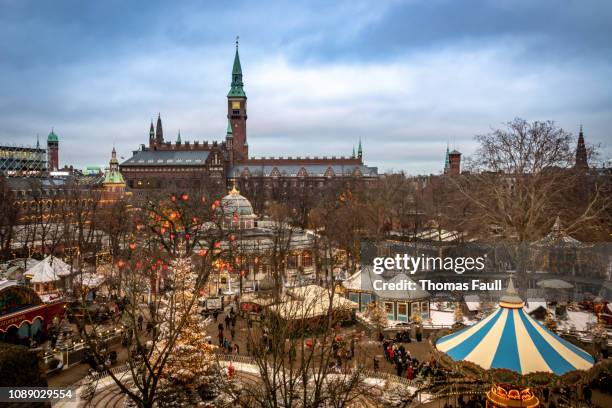 view over tivoli park and copenhagen city centre at christmas - copenhagen christmas stock pictures, royalty-free photos & images