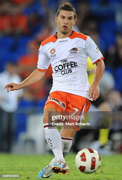 Kasta Barbarouses of the Roar passes the ball during the round 26 A-League match between the North Queensland Fury and the Brisbane Roar at Skilled...