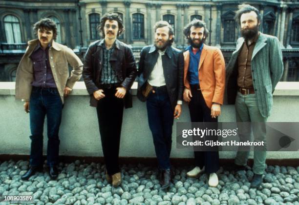 Rick Danko, Robbie Robertson, Levon Helm, Richard Manuel and Garth Hudson of The Band pose for a group portrait in London in 1971.