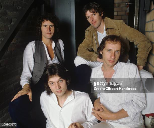Group portrait of Dire Straits, John Illsley, Pick Withers, Mark Knopfler and David Knopfler, in Amsterdam, Netherlands, 1978.