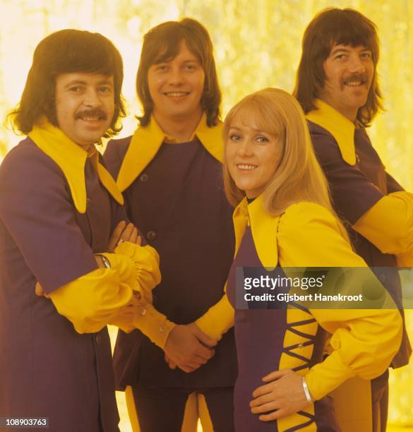 Ken Andrew, Eric McCredie, Sally Carr and Ian McCredie of Middle Of The Road pose for a studio group portrait in 1972 in Amsterdam, Netherlands.