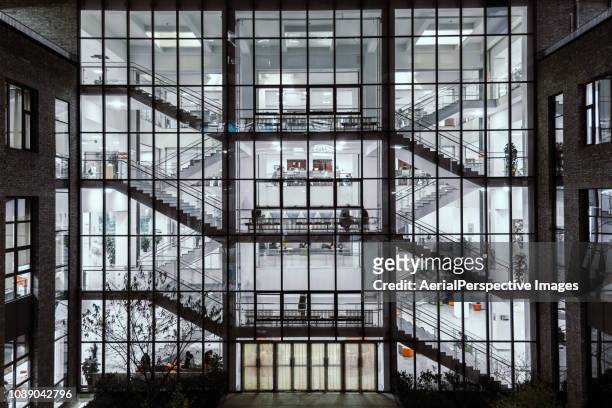 inside the office building at night - floor walk business stock pictures, royalty-free photos & images