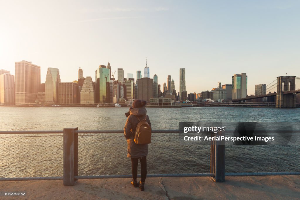 Woman Standing in Front of Manhattan, New York