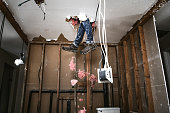 Contractor Man Doing Home Improvement and Demolition