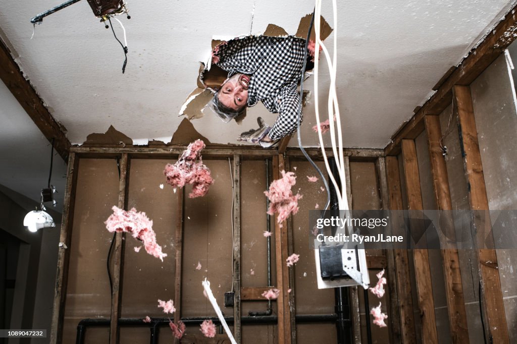 Contractor Man Doing Home Improvement and Demolition