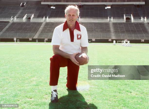 Head coach Bill Walsh of Stanford University poses on the field at Stanford Stadium during March 1977 in Palo Alto, California.