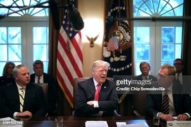 President Donald Trump leads a meeting of his Cabinet, including acting Interior Secretary David Bernhardt and acting Defense Secretary Patrick...