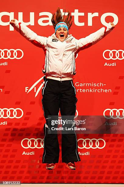 Elisabeth Goergl of Austria collects her gold medal at the medal plaza for winning the Women's Super G during the Alpine FIS Ski World Championships...