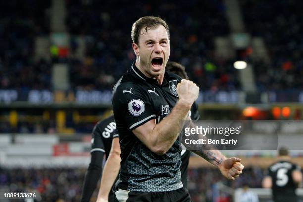Ashley Barnes of Burnley celebrates his goal to take the lead during the Premier League match between Huddersfield Town and Burnley FC at John...