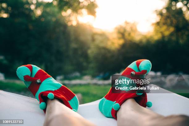 close up of elf shoes on christmas in summer - pantuflas stock pictures, royalty-free photos & images