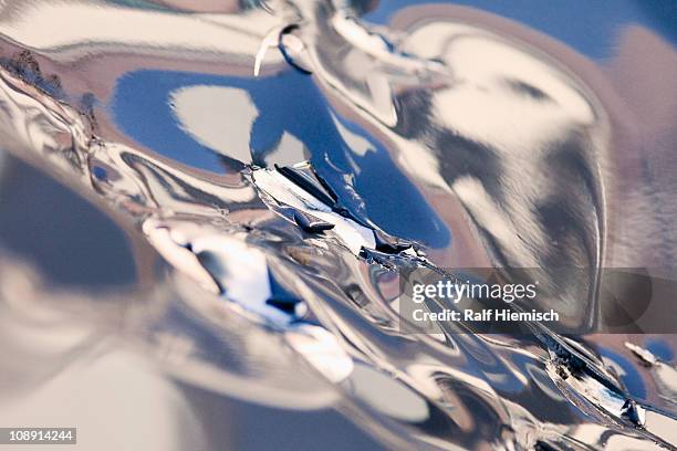 abstract reflections on a silver surface - metal bildbanksfoton och bilder