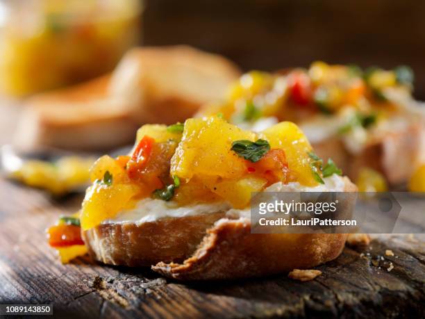 mango chutney crostini with cream cheese - marmalade sandwich stock pictures, royalty-free photos & images