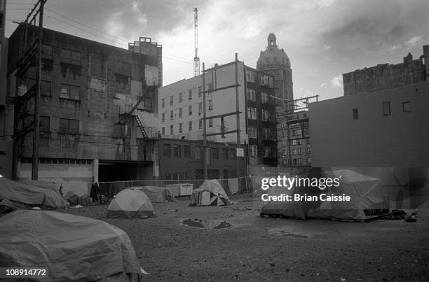 a vacant lot where the homeless have set up makeshift houses, vancouver, bc, canada - homeless shelter stock pictures, royalty-free photos & images